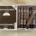 Buy Guantanamera Cristales single cigar UK. Mild machine-made Cuban cigar in clear tube. 5⅞″ × 41, pre-cut. Ideal for beginners. Discreet UK delivery.